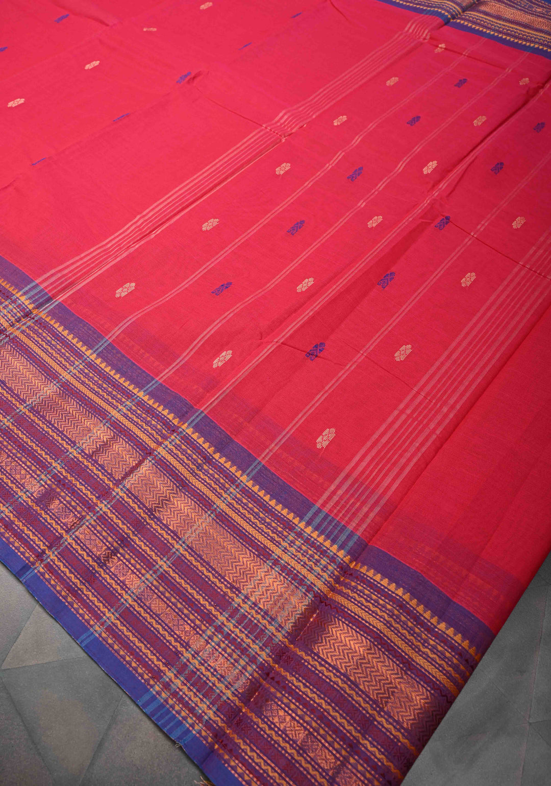 Red Kanchi Cotton Saree with resham butta and contrast zari border