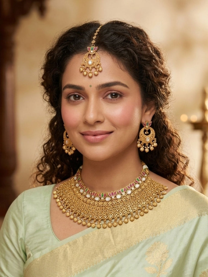 Traditional Gold Temple Jewelry Set with Maang Tikka | SHOBITAM