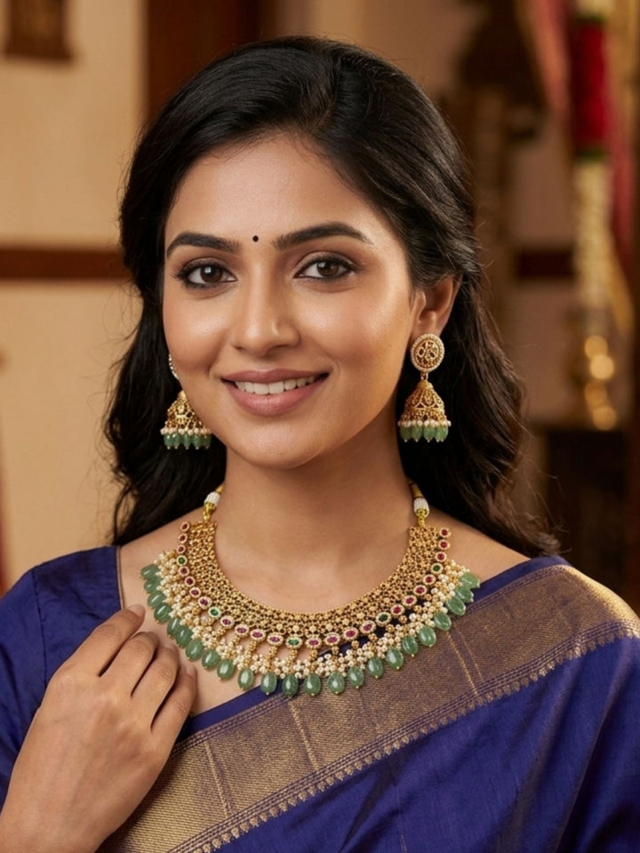 Royal Kundan Choker Set with Emerald Drops & Jhumka Earrings | SHOBITAM