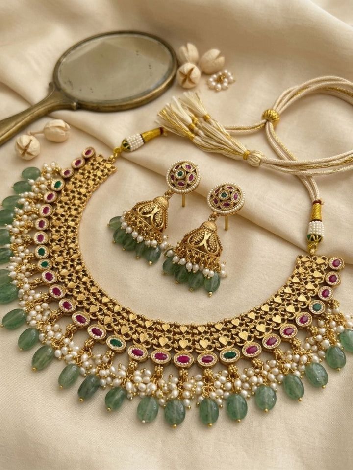 Royal Kundan Choker Set with Emerald Drops & Jhumka Earrings | SHOBITAM