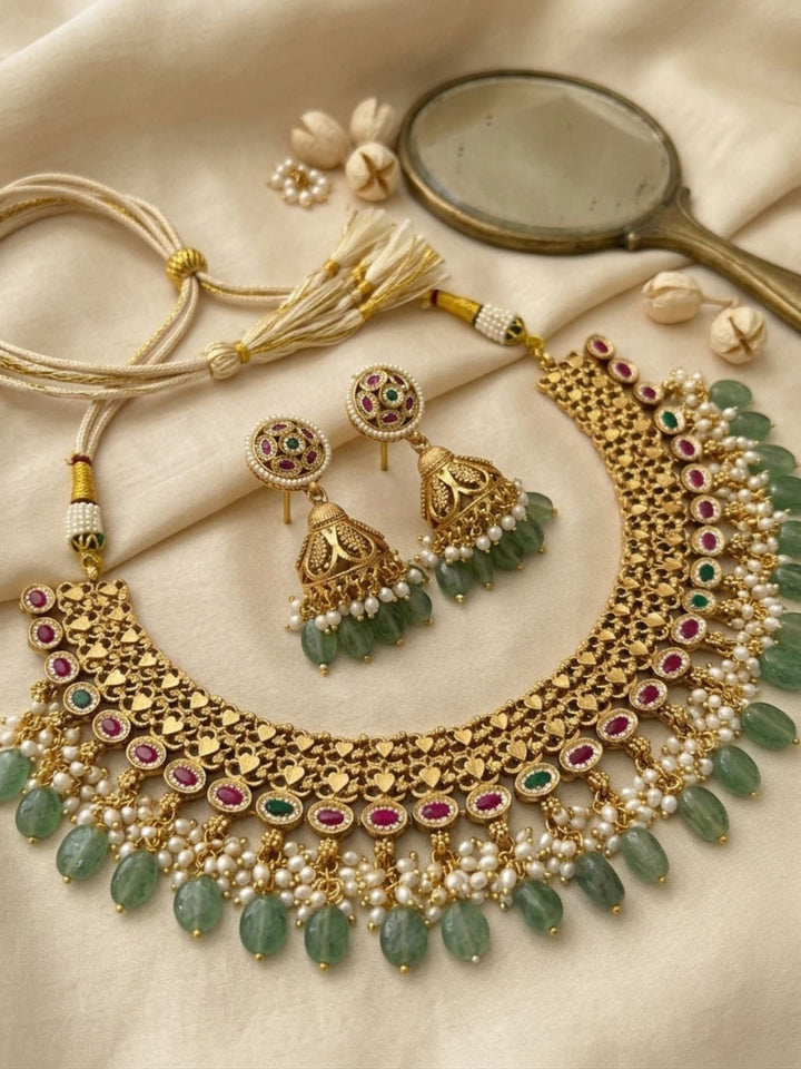 Royal Kundan Choker Set with Emerald Drops & Jhumka Earrings | SHOBITAM