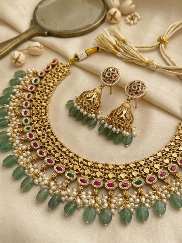 Royal Kundan Choker Set with Emerald Drops & Jhumka Earrings | SHOBITAM