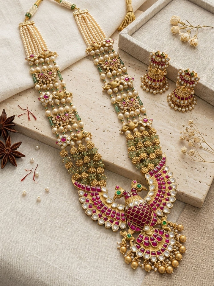 Royal Peacock Kundan Necklace Set with Pearl Layers & Emerald Accents | SHOBITAM