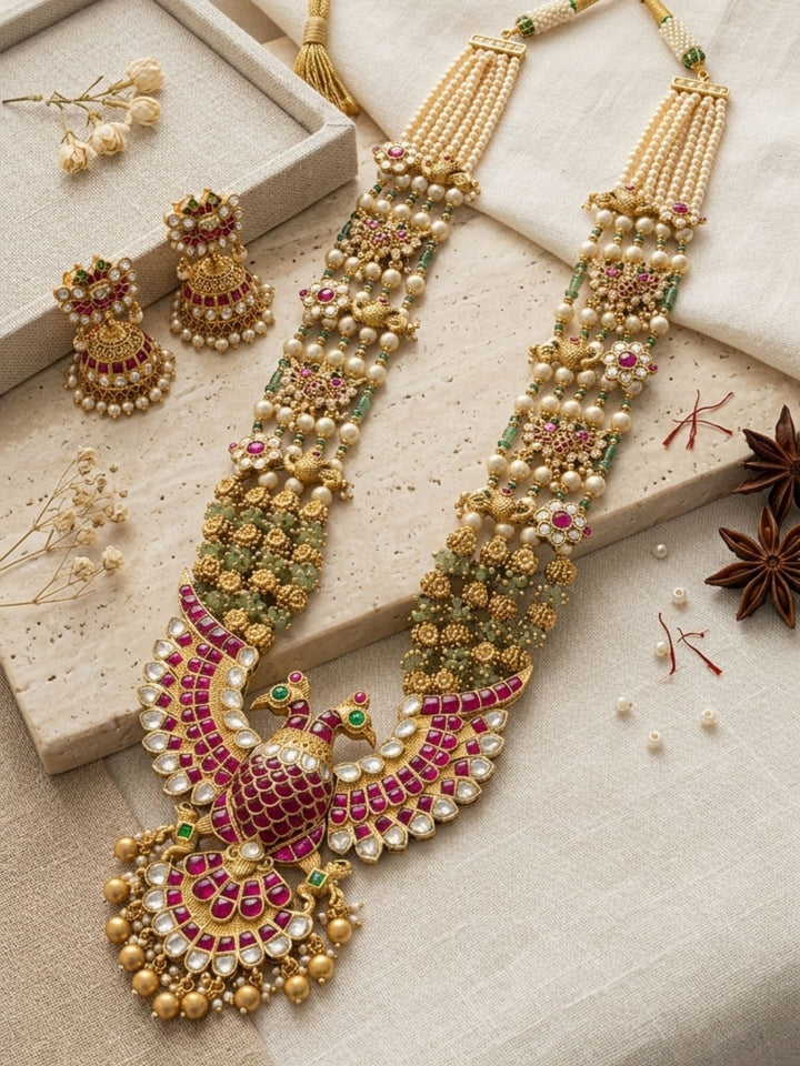 Royal Peacock Kundan Necklace Set with Pearl Layers & Emerald Accents | Shobitam