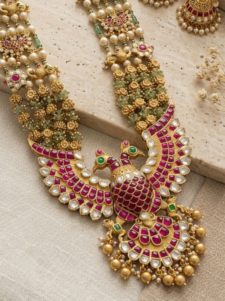 Royal Peacock Kundan Necklace Set with Pearl Layers & Emerald Accents | Shobitam