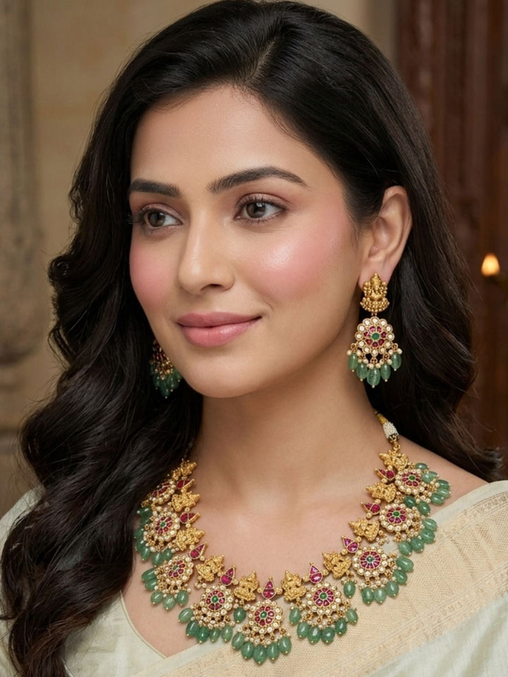 Temple Kundan Choker Set with Lakshmi Motifs & Green Drops | SHOBITAM