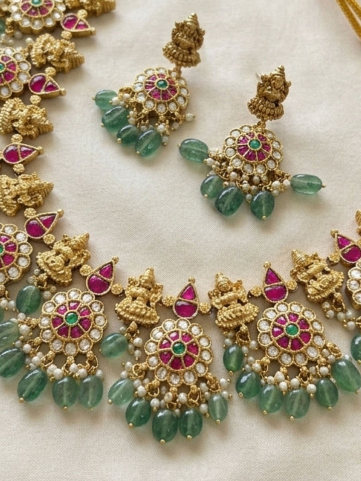 Temple Kundan Choker Set with Lakshmi Motifs & Green Drops | SHOBITAM
