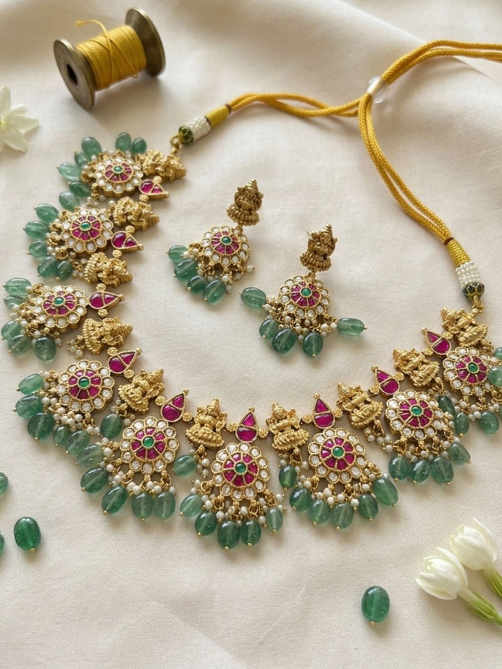 Temple Kundan Choker Set with Lakshmi Motifs & Green Drops | SHOBITAM