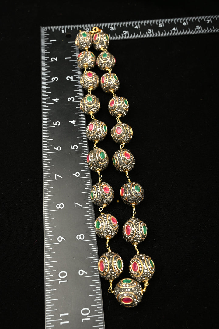 Inlay work Kanak Bead Necklace Set with Red Green and Gray Stones | SHOBITAM
