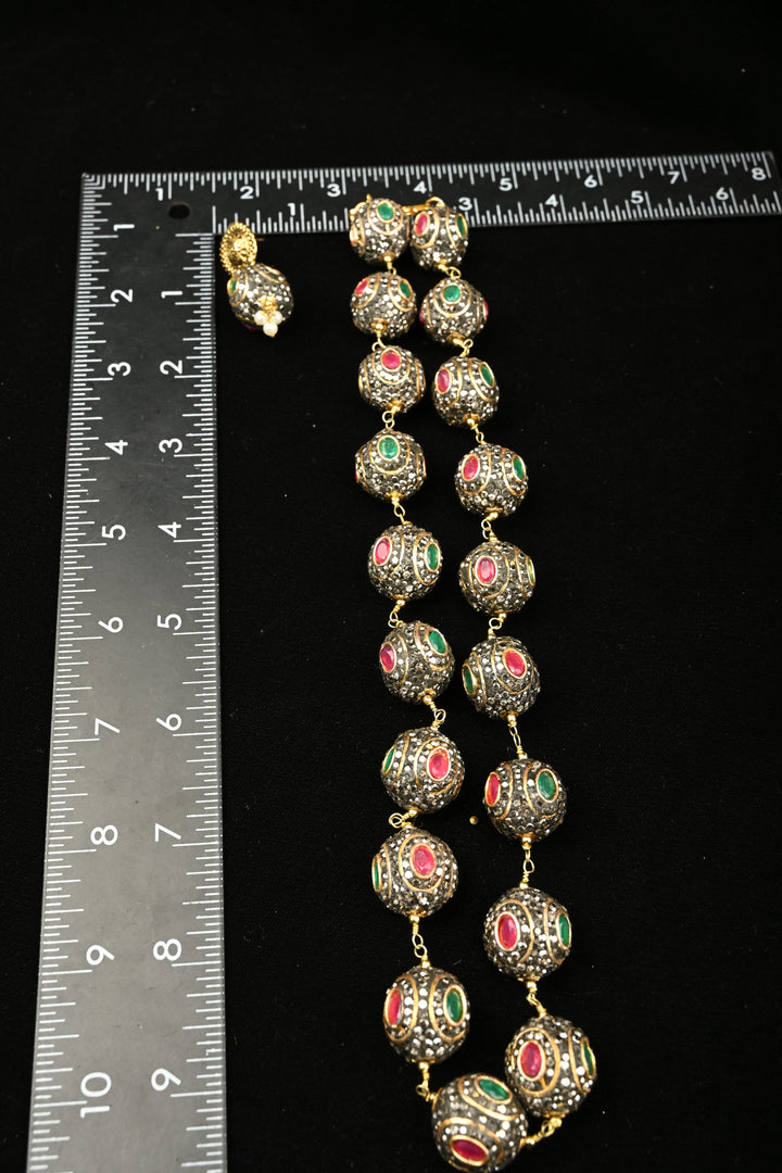 Inlay work Kanak Bead Necklace Set with Red Green and Gray Stones | SHOBITAM