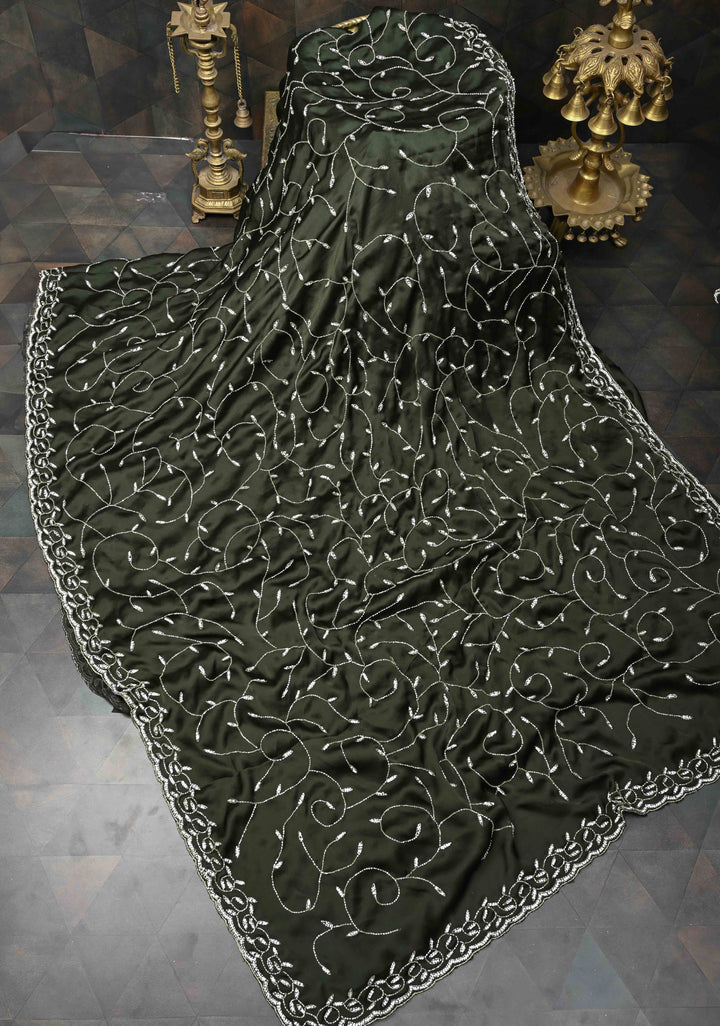 Deep Olive Green machine embroidered Satin Saree with Sequins, Cutdana Stone Work Jaal and Scallop Border