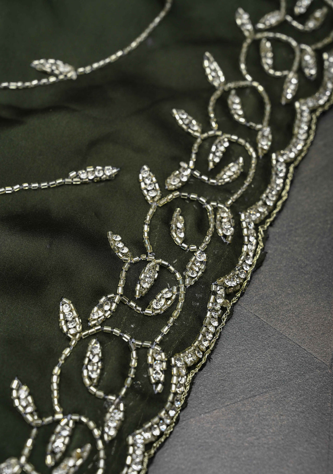 Deep Olive Green machine embroidered Satin Saree with Sequins, Cutdana Stone Work Jaal and Scallop Border