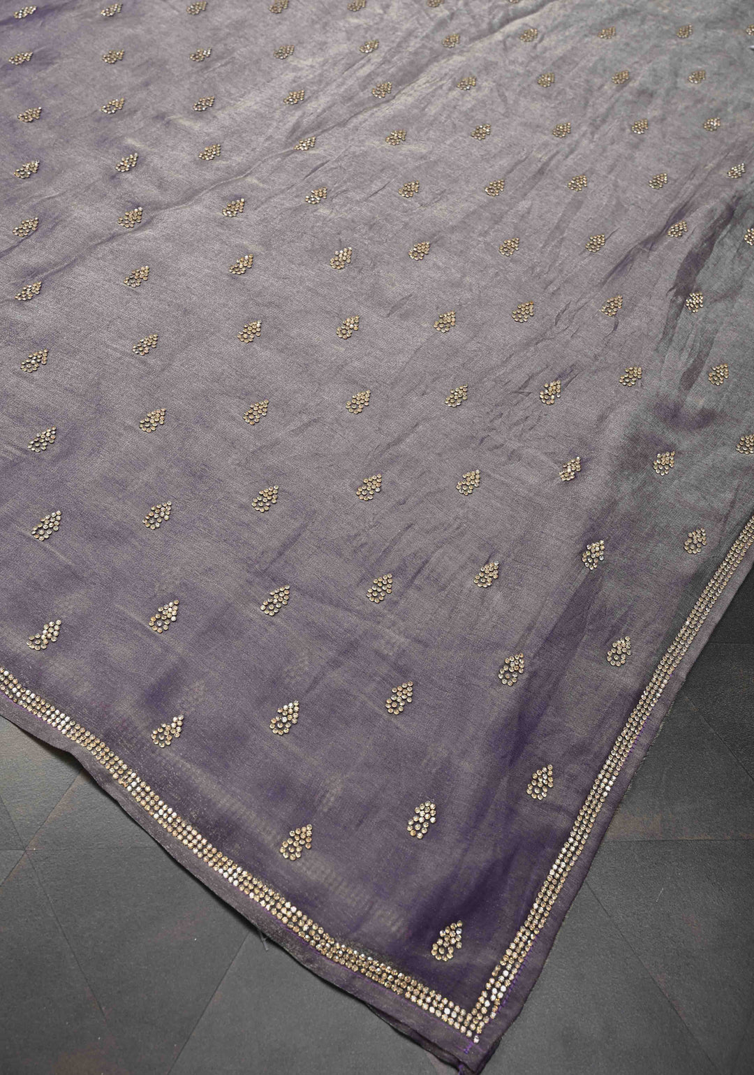 Dusty amethyst shimmer Georgette saree with stone buttas and minimal borders