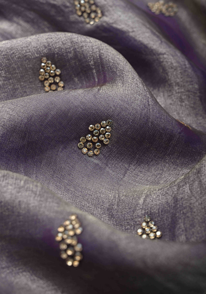 Dusty amethyst shimmer Georgette saree with stone buttas and minimal borders