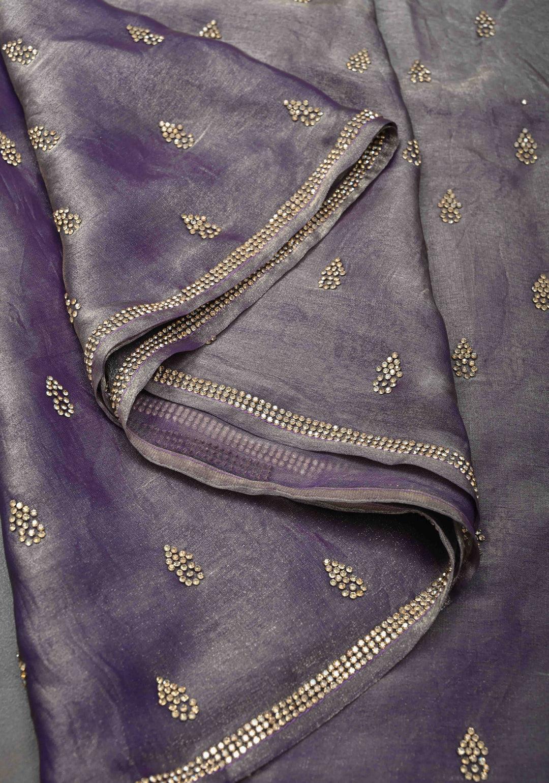 Dusty amethyst shimmer Georgette saree with stone buttas and minimal borders