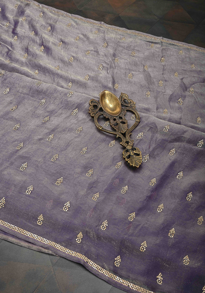 Dusty amethyst shimmer Georgette saree with stone buttas and minimal borders