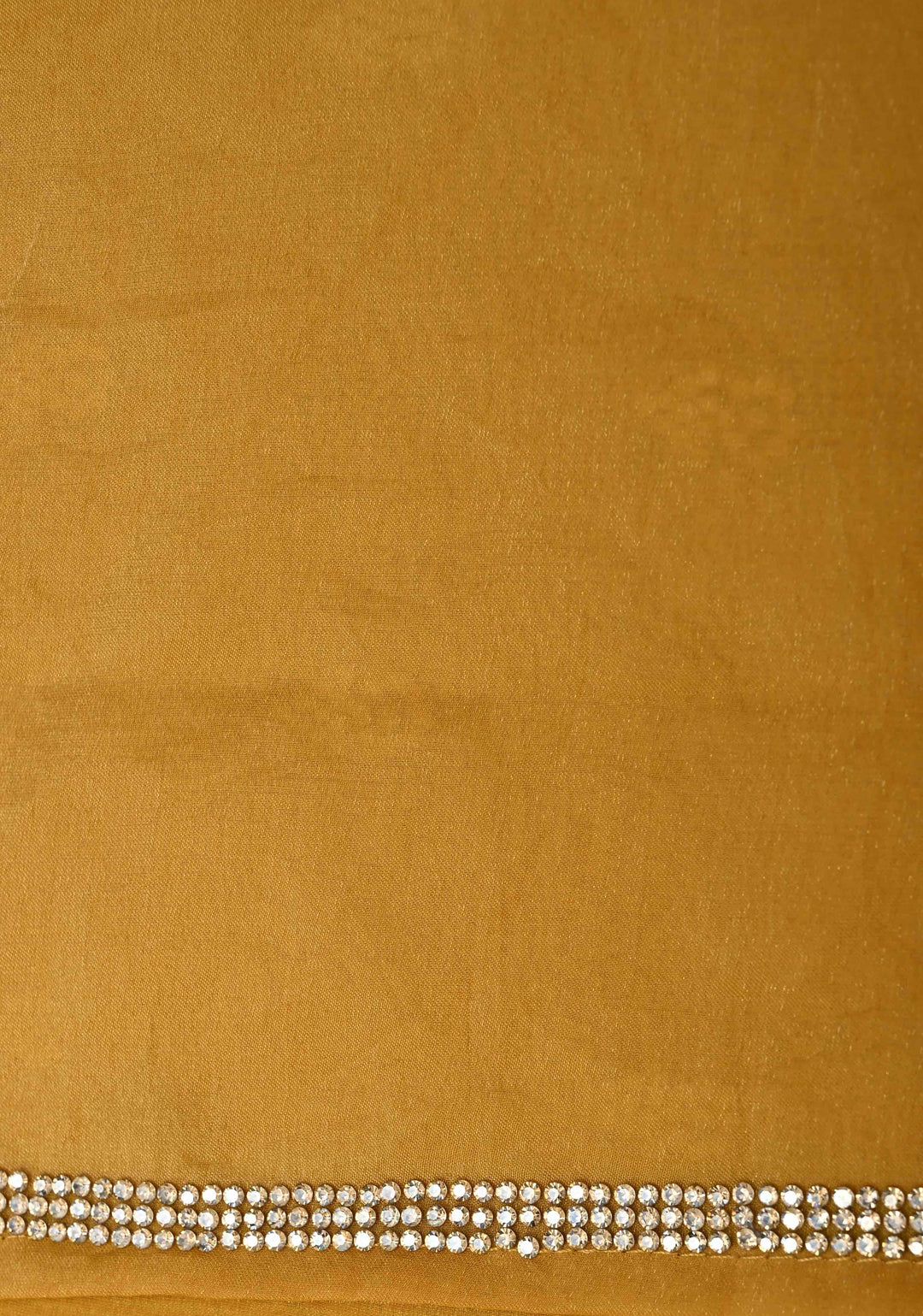 Ochre shimmer Georgette saree with stone buttas and minimal borders