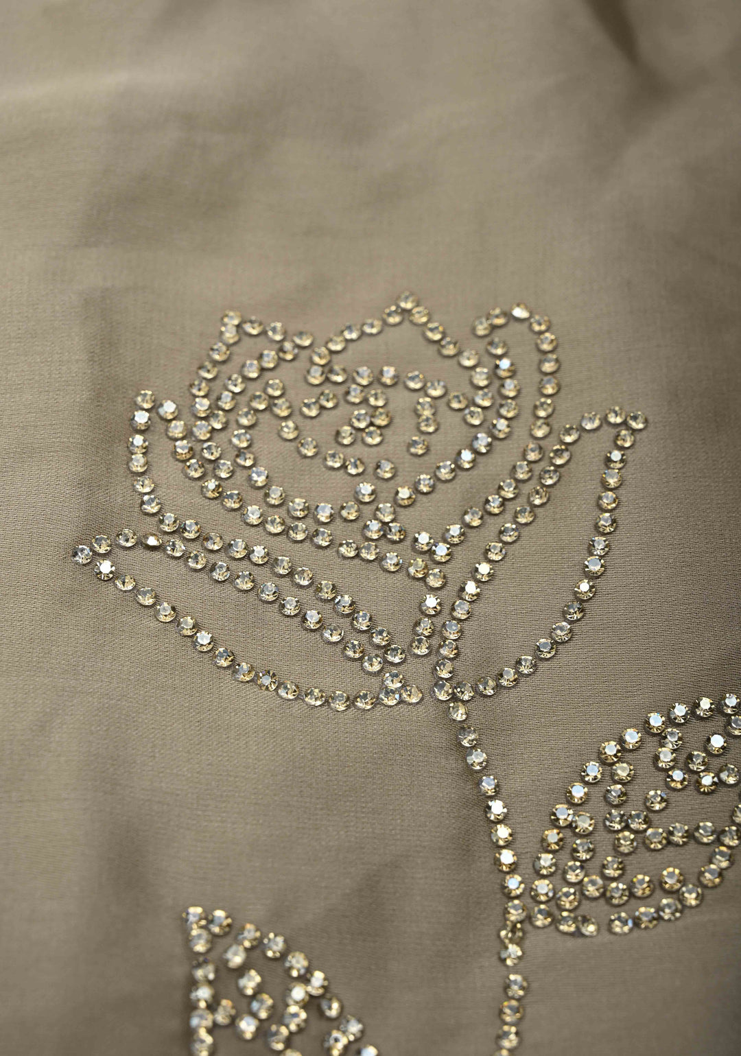 Taupe Satin saree with stone embellishments