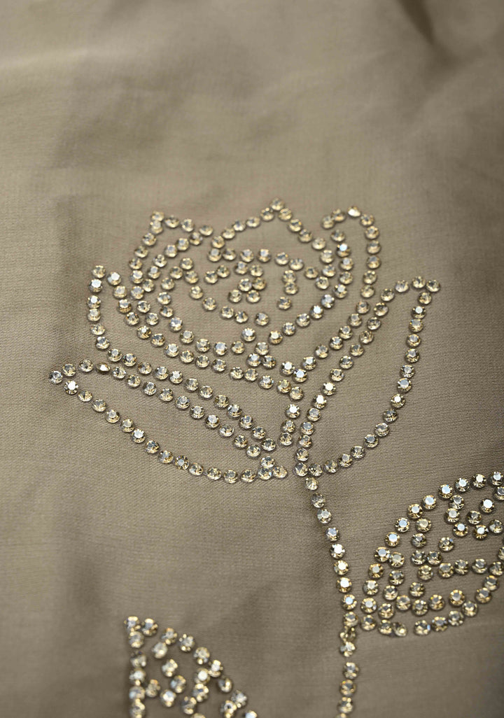 Taupe Satin saree with stone embellishments