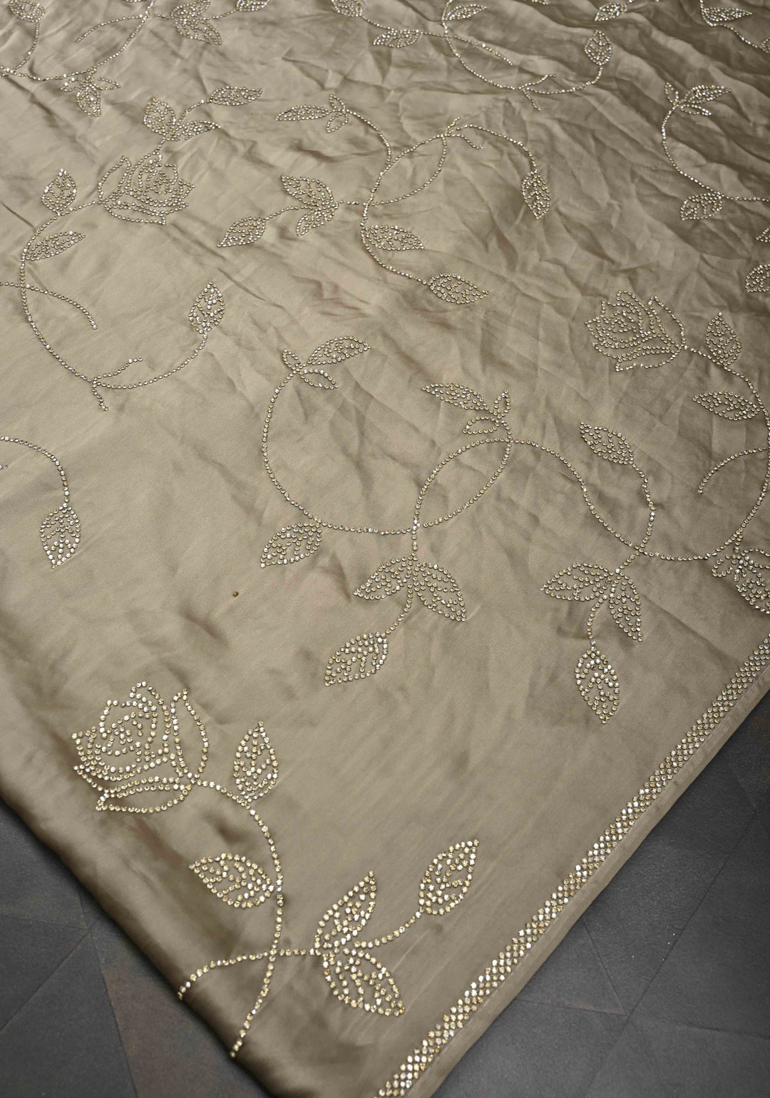 Taupe Satin saree with stone embellishments