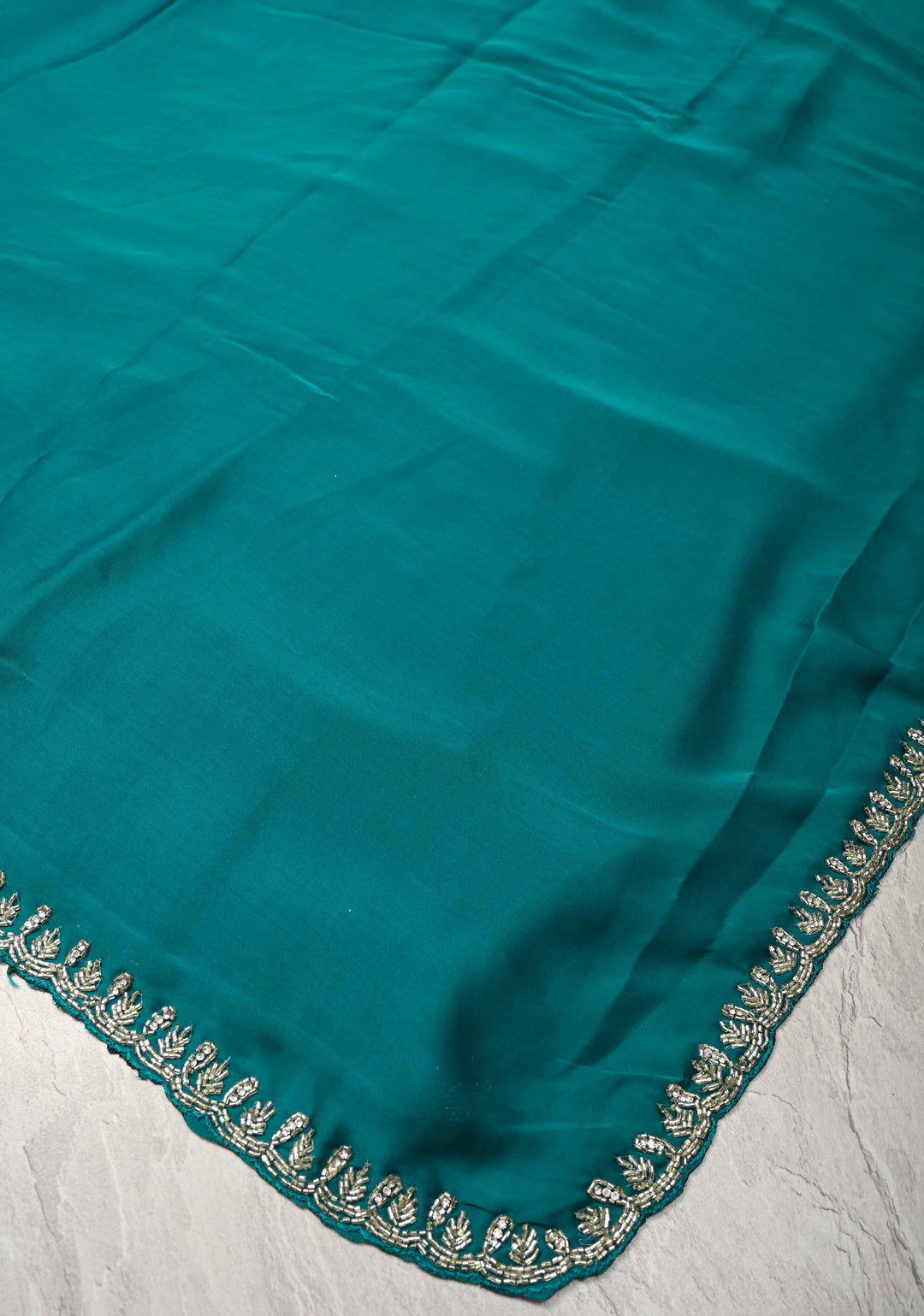 Teal  Satin Geoergette Saree with minimal cutdana borders