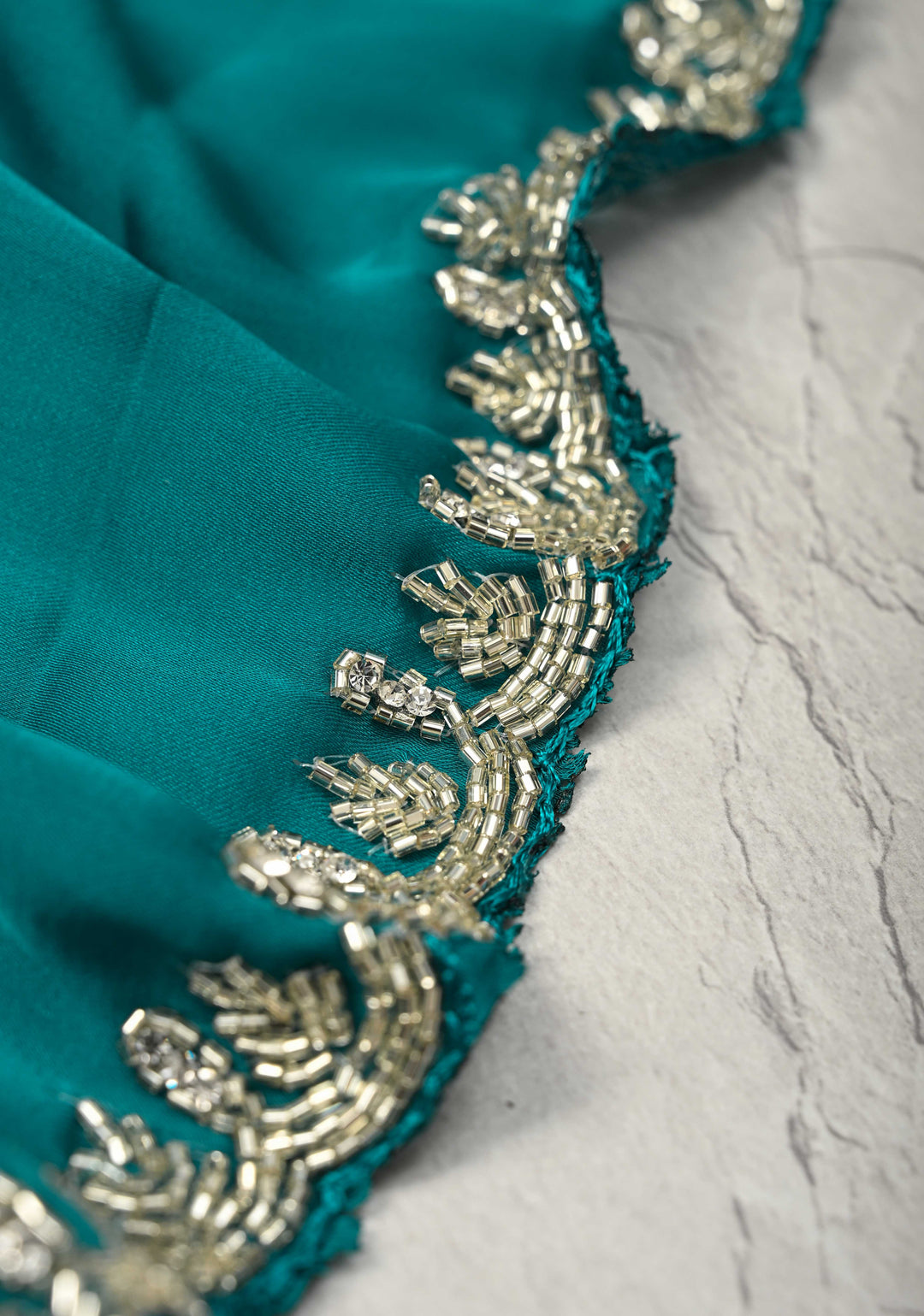 Teal  Satin Geoergette Saree with minimal cutdana borders