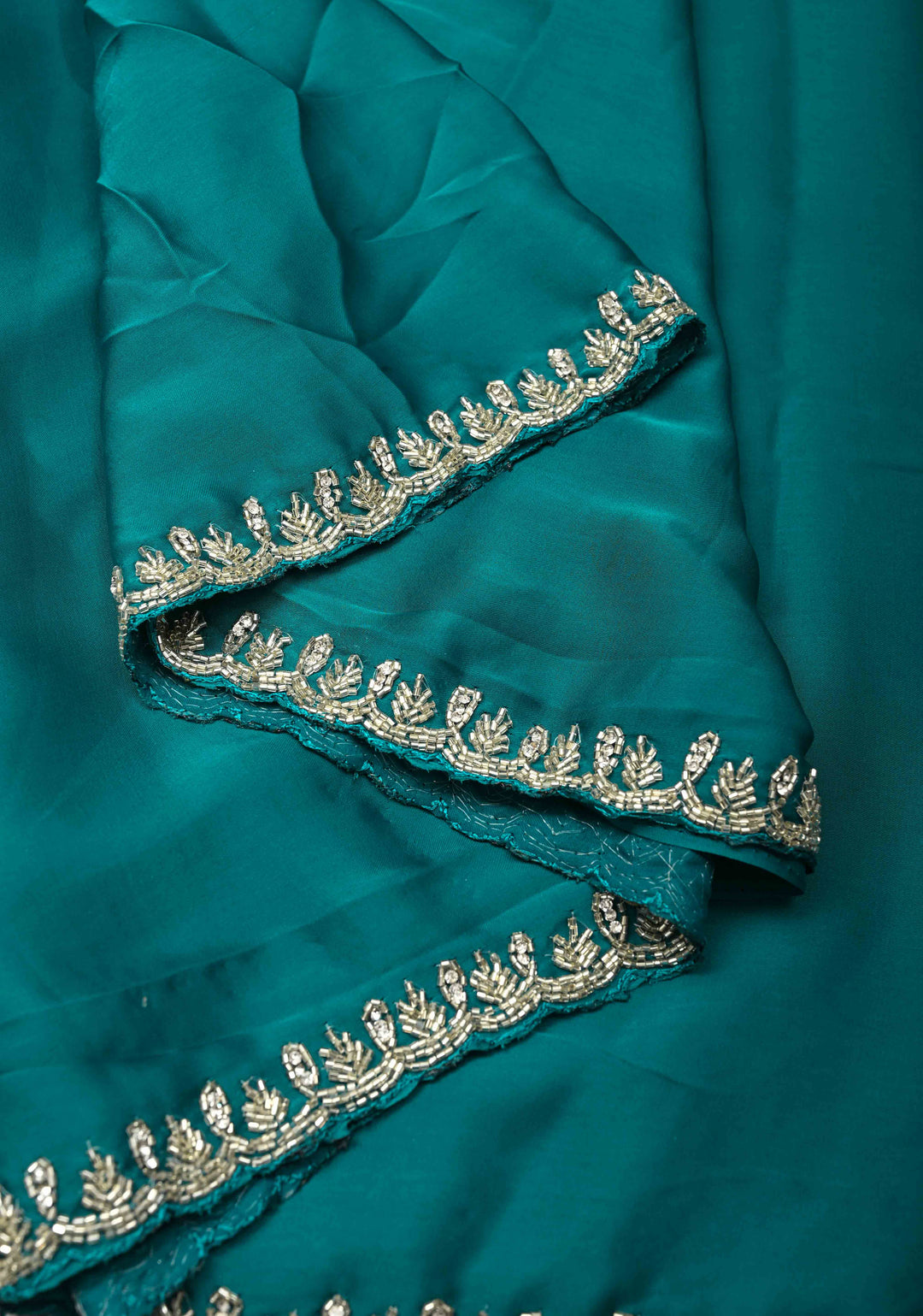 Teal  Satin Geoergette Saree with minimal cutdana borders