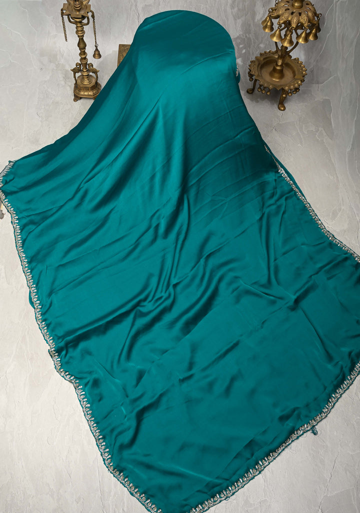 Teal  Satin Geoergette Saree with minimal cutdana borders