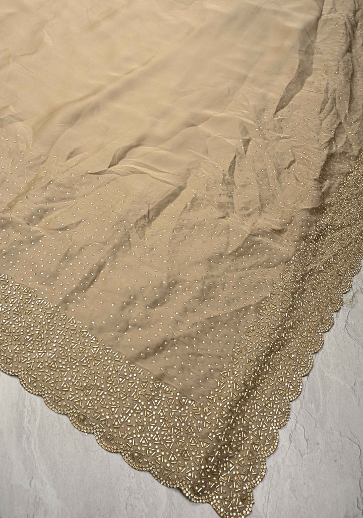 Stunning Taupe Satin Georgette Saree with tone on tone Stones, Cutdana work and Scallop Border