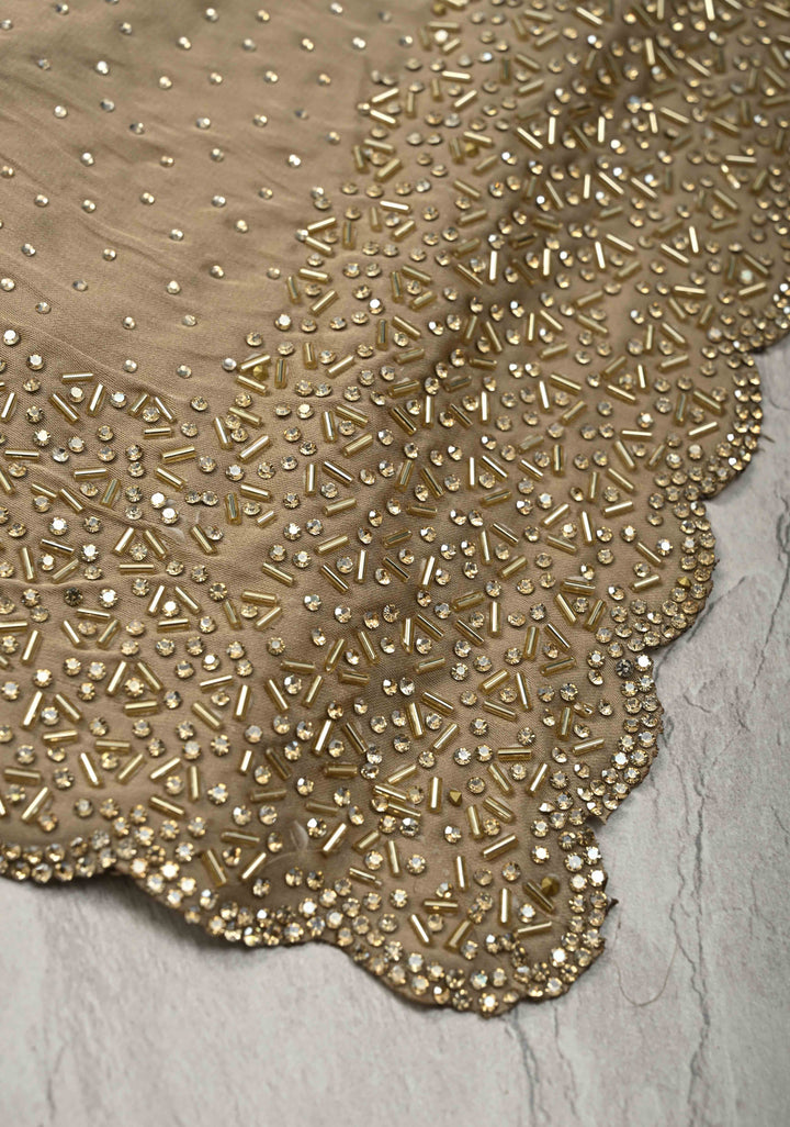 Stunning Taupe Satin Georgette Saree with tone on tone Stones, Cutdana work and Scallop Border