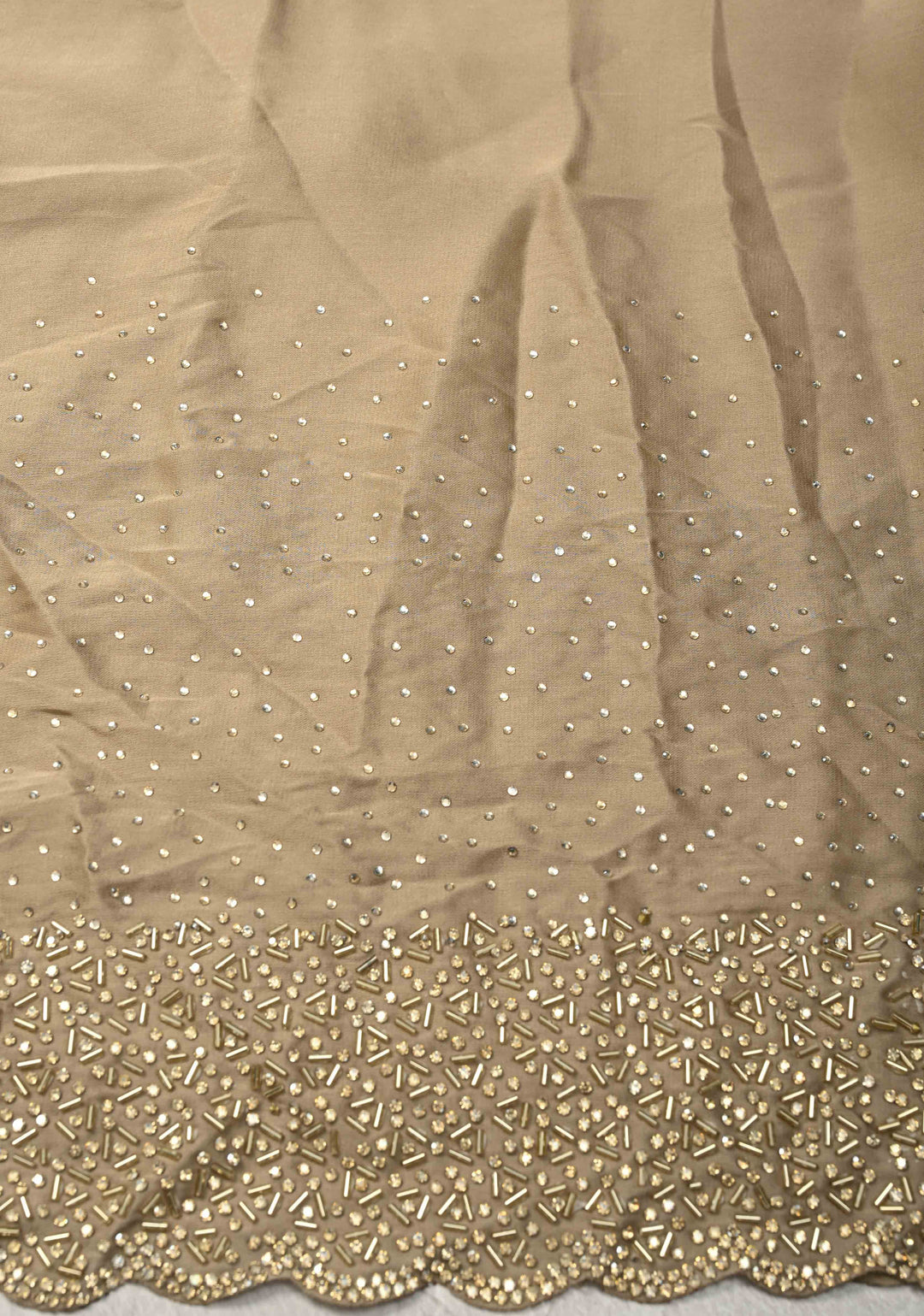 Stunning Taupe Satin Georgette Saree with tone on tone Stones, Cutdana work and Scallop Border