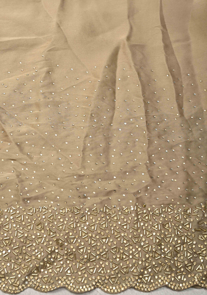 Stunning Taupe Satin Georgette Saree with tone on tone Stones, Cutdana work and Scallop Border