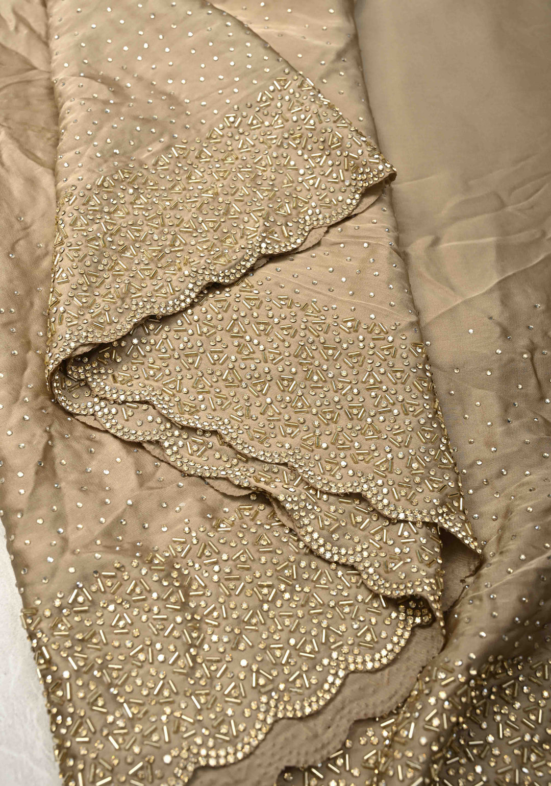 Stunning Taupe Satin Georgette Saree with tone on tone Stones, Cutdana work and Scallop Border