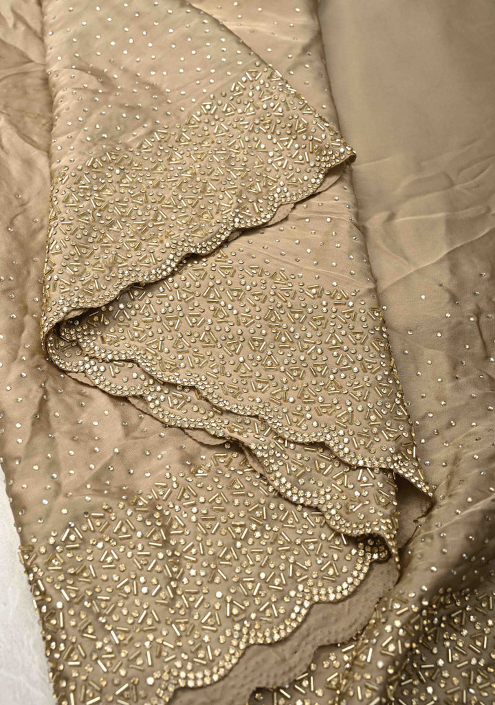 Stunning Taupe Satin Georgette Saree with tone on tone Stones, Cutdana work and Scallop Border