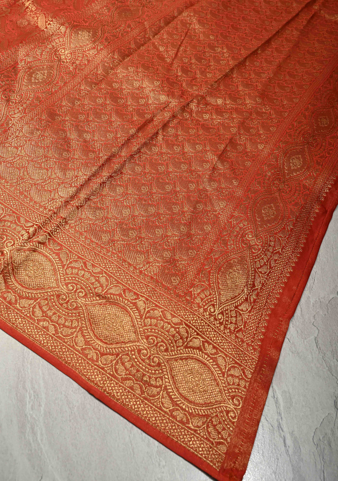 Reddish Orange Vegan Viscose Silk Saree with Floral Brocade and Zari Border