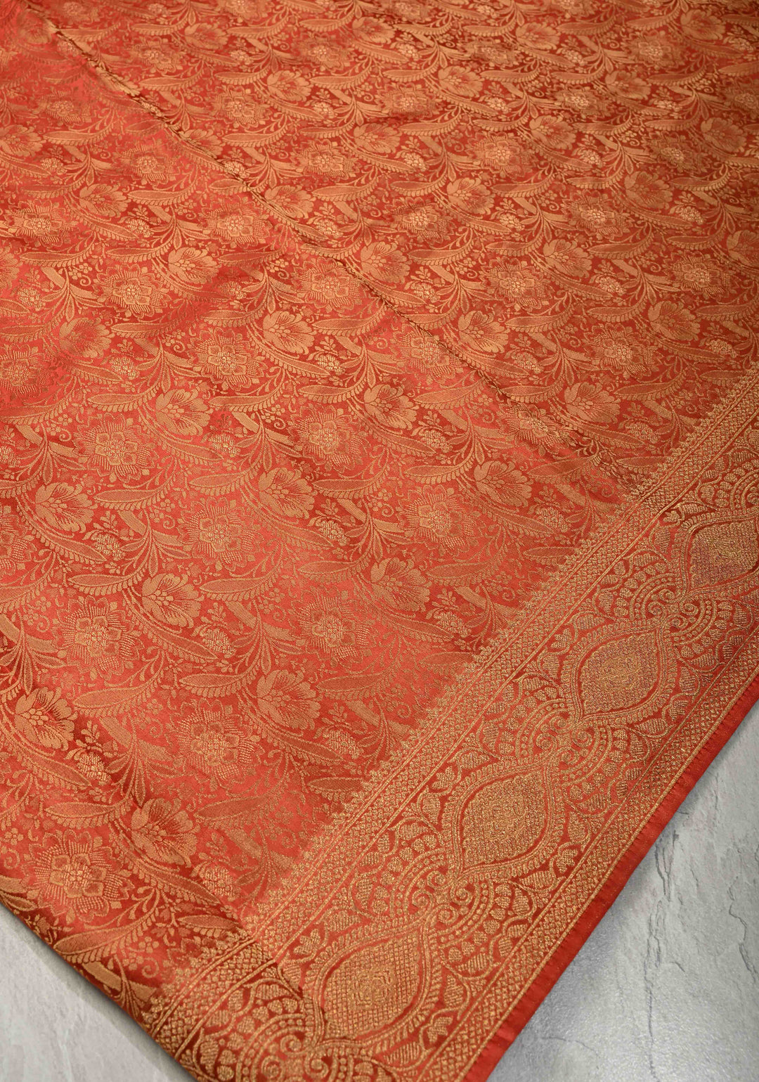 Reddish Orange Vegan Viscose Silk Saree with Floral Brocade and Zari Border
