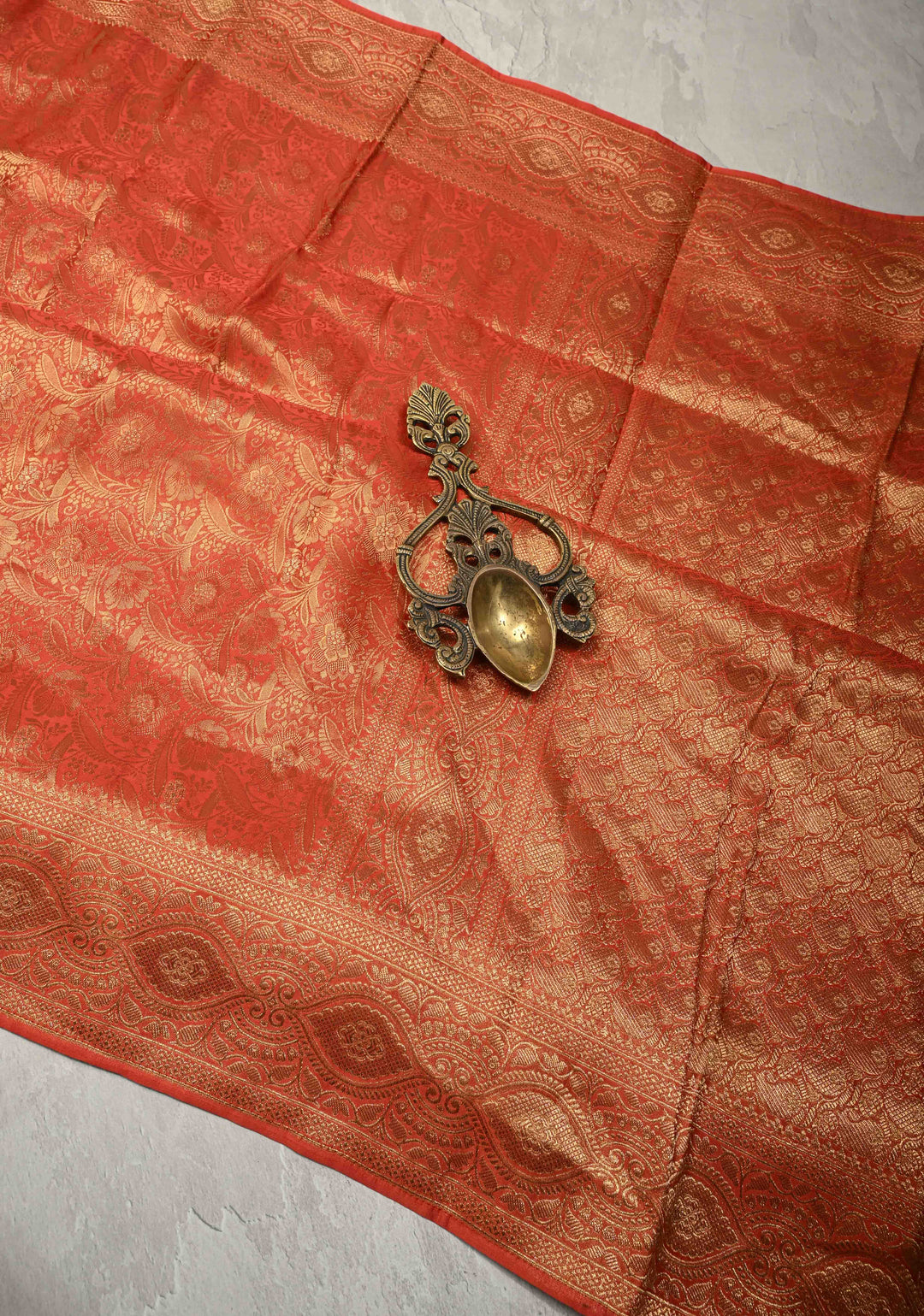 Reddish Orange Vegan Viscose Silk Saree with Floral Brocade and Zari Border