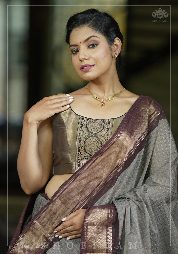 Bronze tissue brocade U  neck sleeveless blouse with black brocade detailing