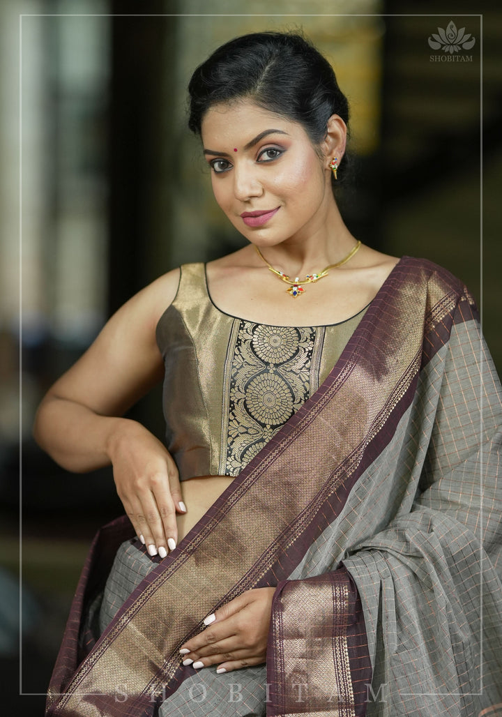 Bronze tissue brocade U  neck sleeveless blouse with black brocade detailing