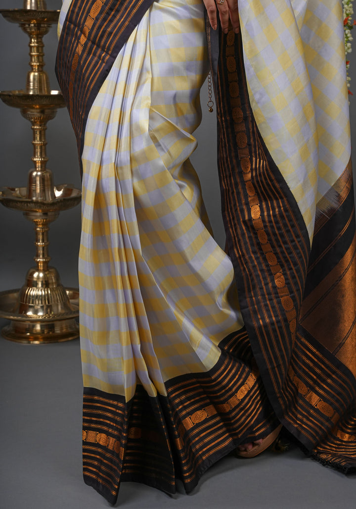 Checks with Korvai Border Gadwal Pure Silk Saree in Butter Yellow and Heather Gray  | SILK MARK CERTIFIED