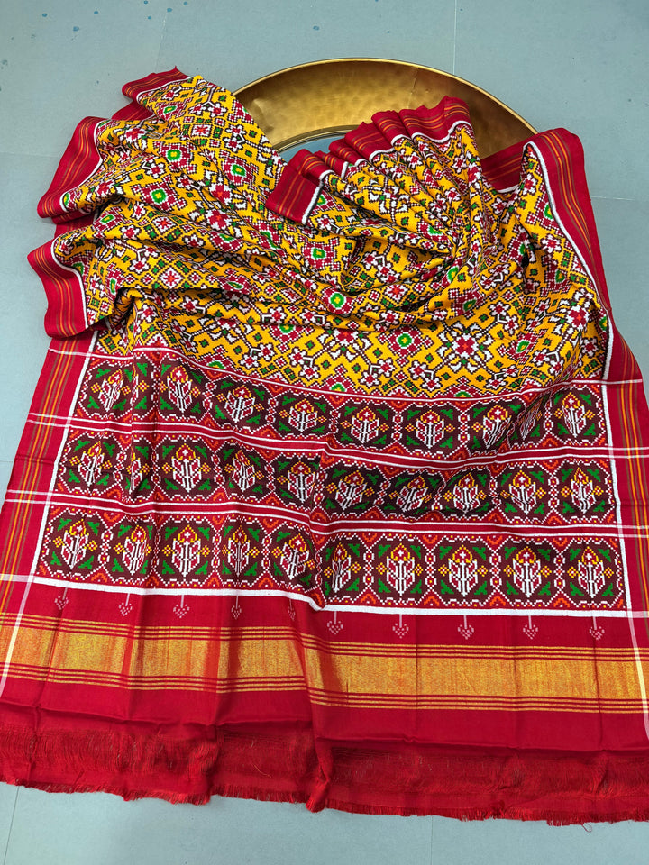 Yellow  Authentic Patan Patola Double Ikkat Pure Silk Saree With Geometric Brocade and Contrast Red Pallu on Both Side | SILK MARK CERTIFIED | SHOBITAM