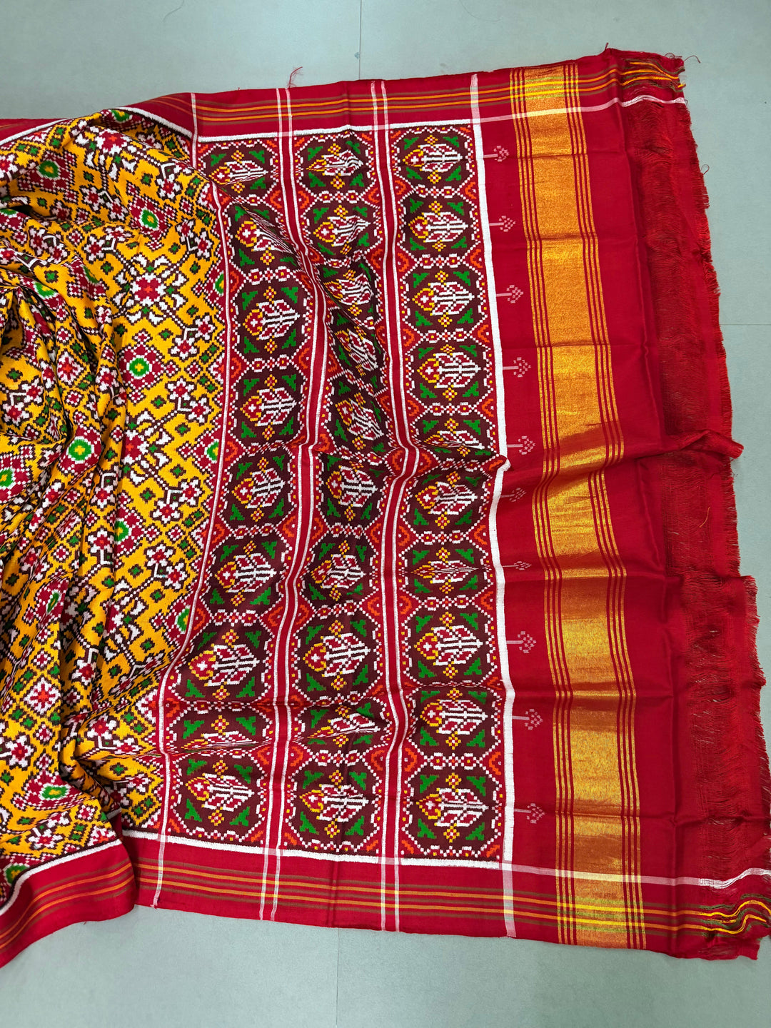 Yellow  Authentic Patan Patola Double Ikkat Pure Silk Saree With Geometric Brocade and Contrast Red Pallu on Both Side | SILK MARK CERTIFIED | SHOBITAM