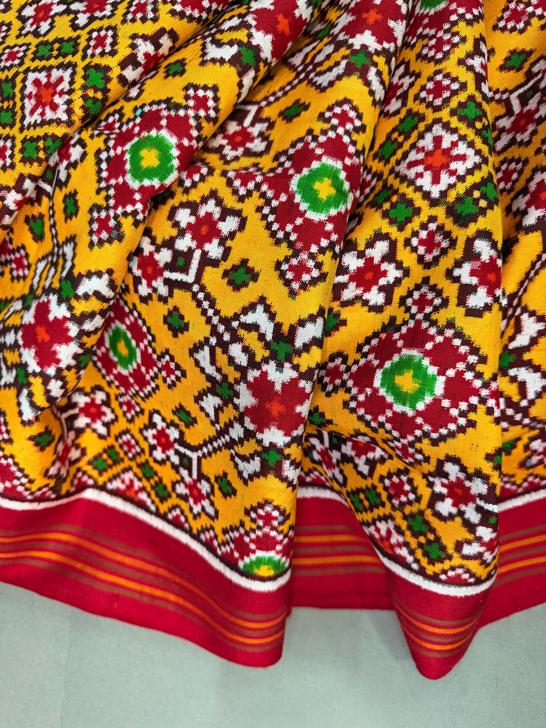 Yellow  Authentic Patan Patola Double Ikkat Pure Silk Saree With Geometric Brocade and Contrast Red Pallu on Both Side | SILK MARK CERTIFIED | SHOBITAM