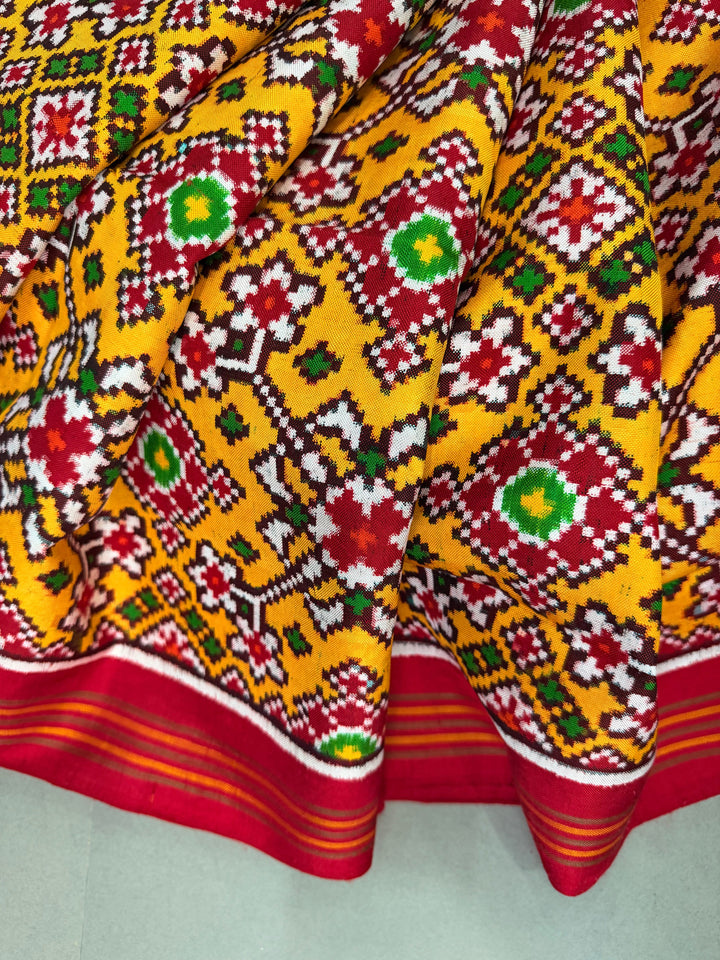 Yellow  Authentic Patan Patola Double Ikkat Pure Silk Saree With Geometric Brocade and Contrast Red Pallu on Both Side | SILK MARK CERTIFIED | SHOBITAM
