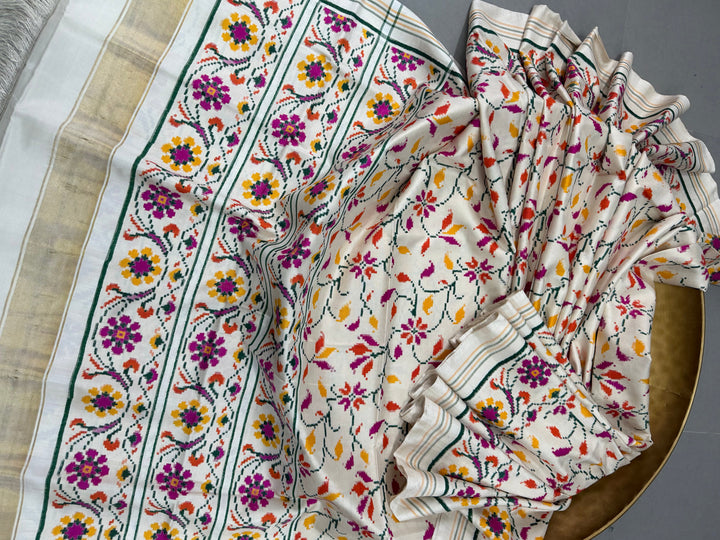 Ivory  Authentic Patan Patola Double Ikkat Pure Silk Saree With Floral Brocade Jaal and Pallu on Both Side | SILK MARK CERTIFIED | SHOBITAM