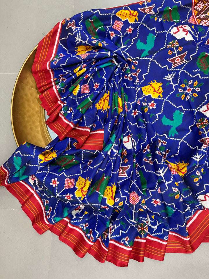 Royal Blue Authentic Patan Patola Double Ikkat Pure Silk Saree With Animal-Plant Motifs all Over and Contrast Red Pallu on Both Side | SILK MARK CERTIFIED | SHOBITAM