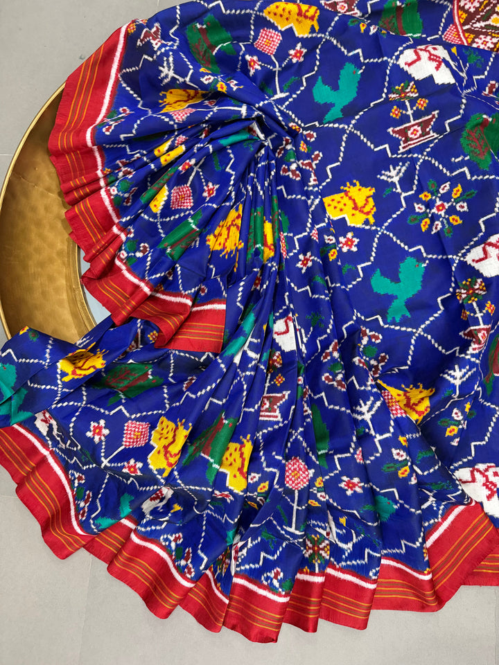 Royal Blue Authentic Patan Patola Double Ikkat Pure Silk Saree With Animal-Plant Motifs all Over and Contrast Red Pallu on Both Side | SILK MARK CERTIFIED | SHOBITAM