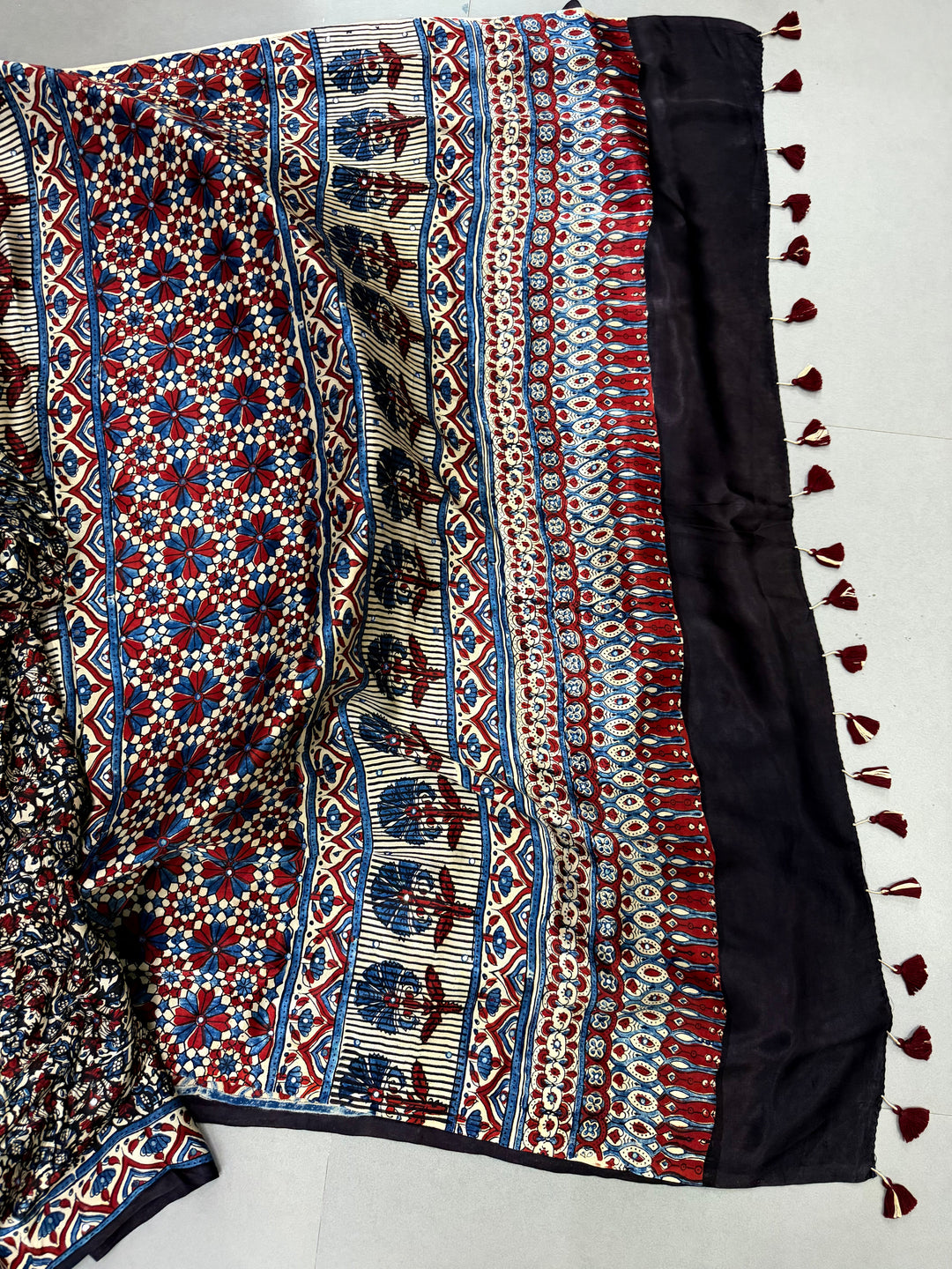 Multicolor Authentic Ajrakh Hand Block Print on Modal Silk Saree with Hand Embellished Tikki work and Minimal Border | SHOBITAM