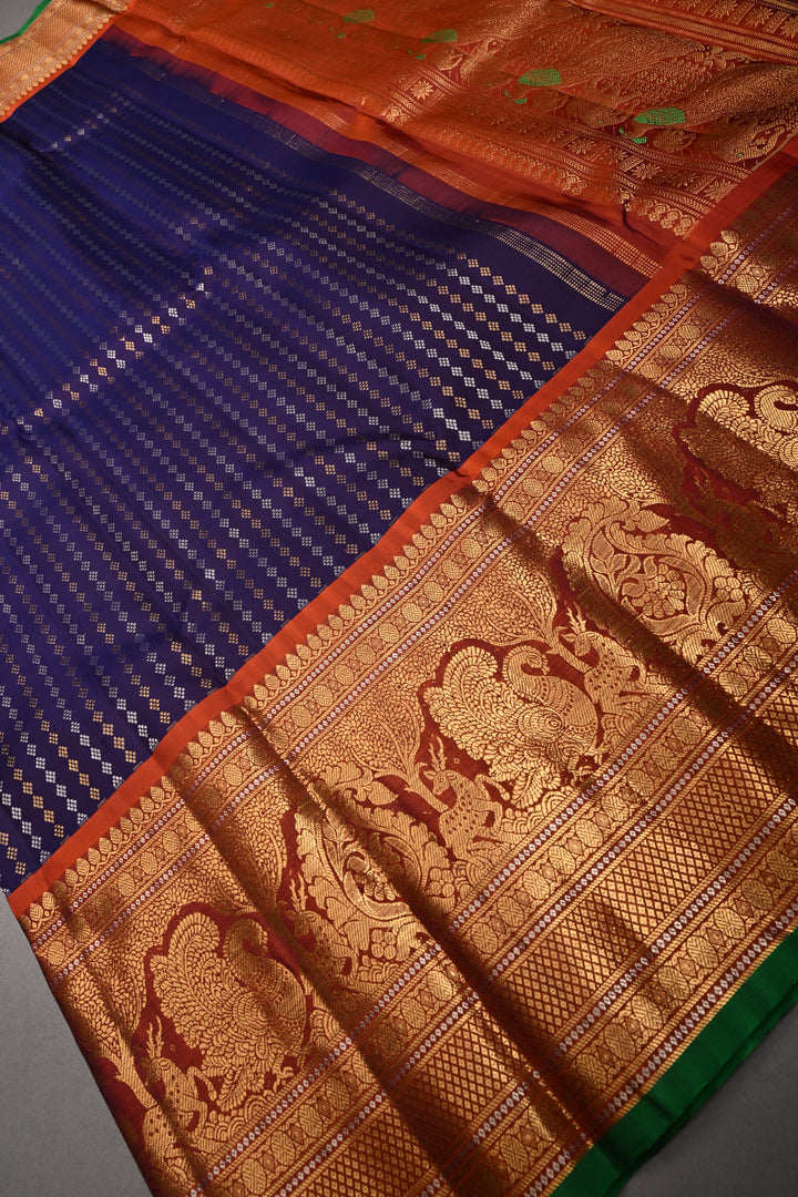 Royal Purple Pure Gadwal Silk Saree with Gold-Silver Ornate Zari Stripes and Contrast Wide Zari Border | SILK MARK CERTIFIED |SHOBITAM