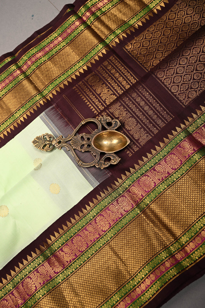 Korvai Tea Green Pure Gadwal Silk Saree with Zari Buttas and Contrast Wide Zari Border | SILK MARK CERTIFIED | SHOBITAM